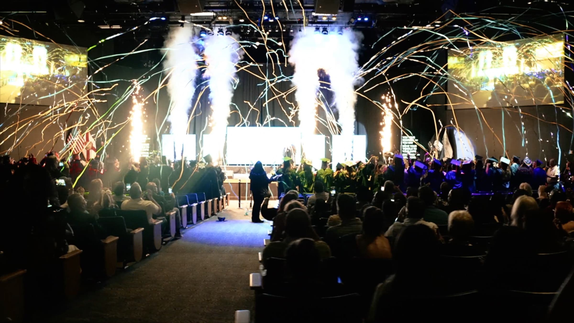 Confetti and streamer finale over the crowd at IRSC commencement